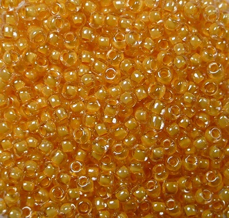 tr-11-0984 toho rounds 11-0 Inside Color Crystal Papaya Lined