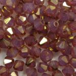 04-mc-01000-14497 4 mm CZ bicones white opal bronze orange luster