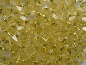 04-MC-10020 Light Topaz bicones 4 mm 50 stuks