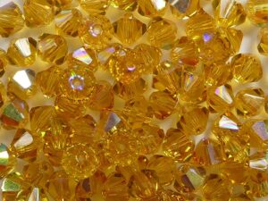 04-MC-10080-28701 Dark Topaz AB bicones 4 mm 50 stuks