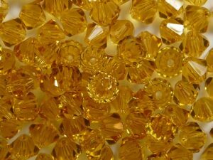 04-MC-10080 Dark Topaz bicones 4 mm 50 stuks