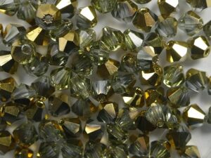 04-MC-30020-26441 Light Sapphire Brass bicones 4 mm 50 stuks