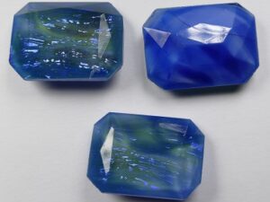OC-25x18-BG-LS Blauw-Groen Octagon 25 x 18 mm. (lichte schade)