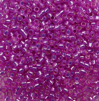 TR-15-2107 Toho Rocailles 15-0 Silver Lined Milky Hot Pink color 2107