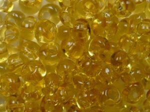 TM-04-0002 Transparent Light Topaz Magatama 4 mm. TOHO