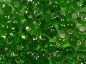 TM-04-0027 Silver Lined Peridot Magatama 4 mm. TOHO