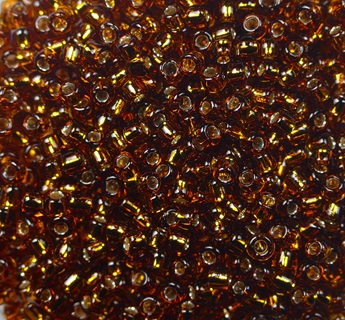 tr-11-0034 toho rocailles 11-0 silver lined smoky topaz color 34