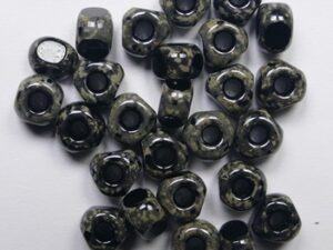 0010547 Jet Travertin Table Cut Beads 6x4 mm. 50 stuks
