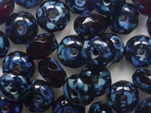 0050362 Garnet Travertin Czech Glass Facet Donut 7x4 mm 15 stuks - Afbeelding 1