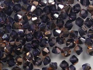 03-MC-20510-27101 Tanzanite Capri Gold bicones 3 mm 50 stuks