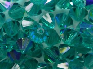 06-MC-60220-28701 Blue Zircon AB bicones 6 mm 24 stuks