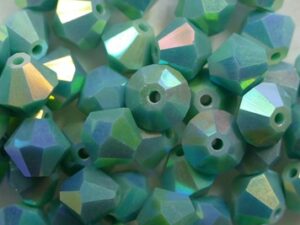 06-MC-63130-28701X2 Opaque Green Turquoise 2XAB bicones 6 mm 24 stuks