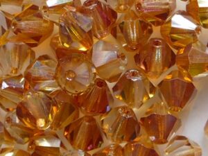 06-MC-00030-29121 Crystal Apricot bicones 6 mm 24 stuks