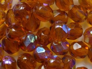 FP1-06-10090X Dark Topaz AB Czech Glass Facet Firepolish 6 mm 25 stuks