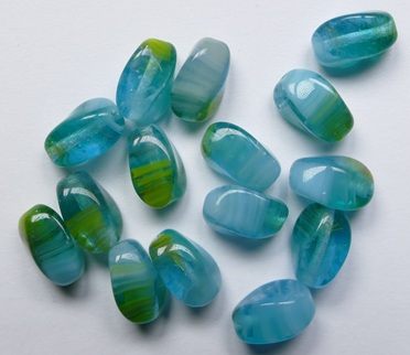 0090528 Mixed Opal-Transparent Blue-Green-White Czech Glass Carved Olive Bead 6x9 mm color R1463