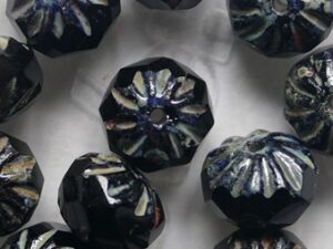 Jet Travertin Crueller beads 7x10 mm