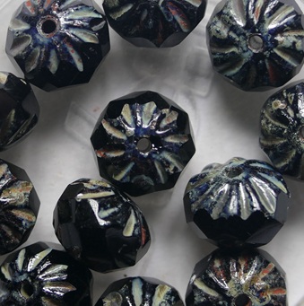 0010569 Jet Travertin Crueller beads 7x10 mm color 23980-86805 Jet Travertin Crueller beads 7x10 mm